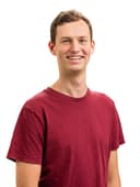 Een afbeelding van Joris die lachend kijkt